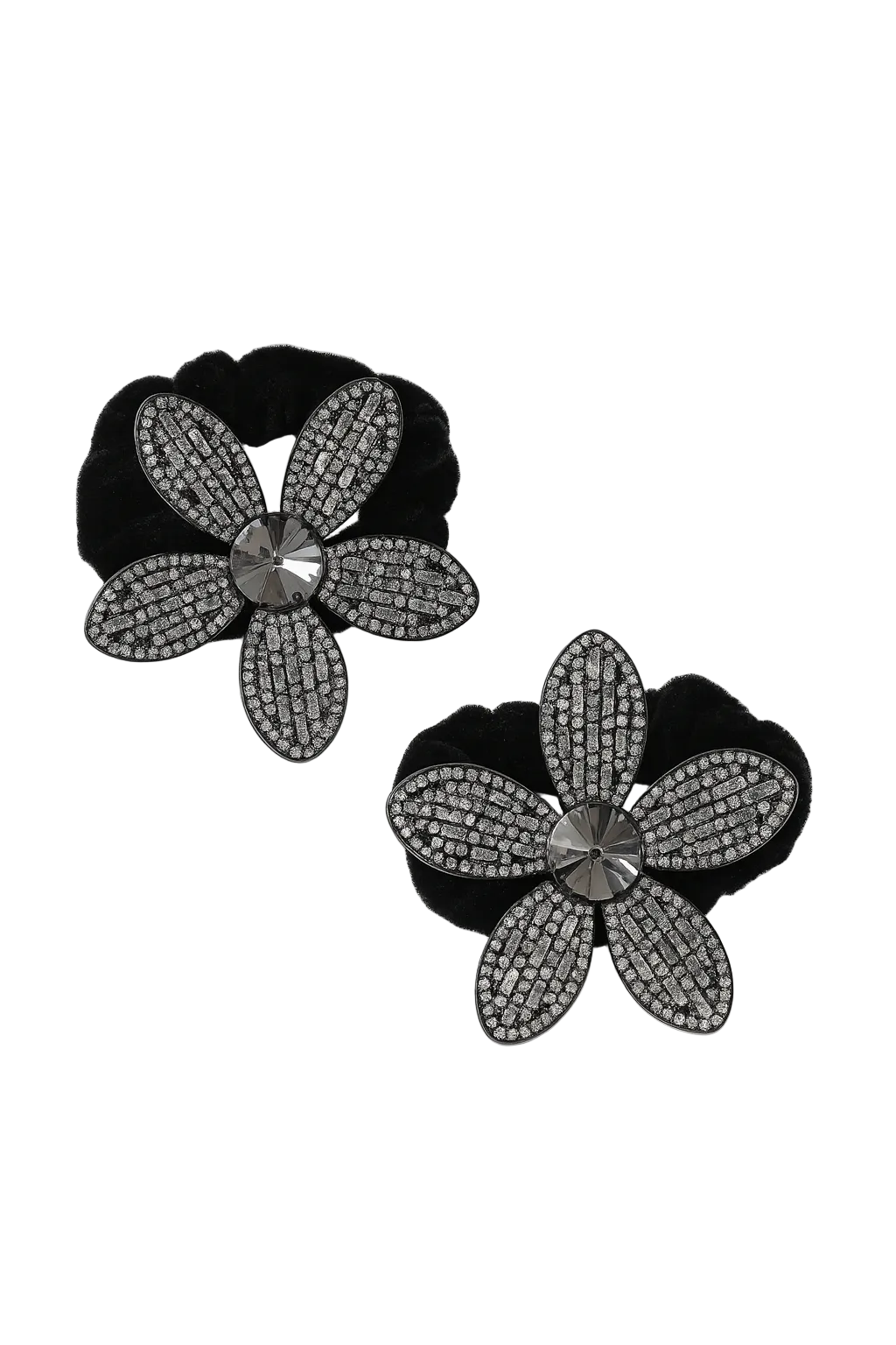 Black flower-shaped earrings with diamond-like stones on a white background