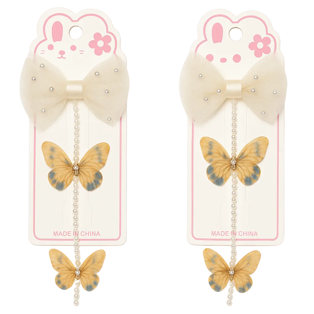 Two butterfly hair clips with decorative bows on packaging featuring cartoon bunny faces.