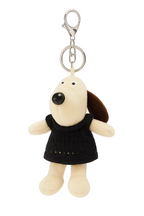 Dog-shaped keychain with a black sweater on a white background