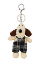 Plush dog keychain with a keyring on a white background