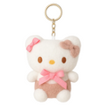 Plush keychain of a cat with a pink bow on a white background