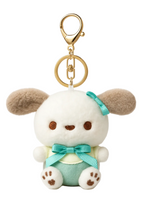 Plush keychain shaped like a cute animal with a green bow on a white background