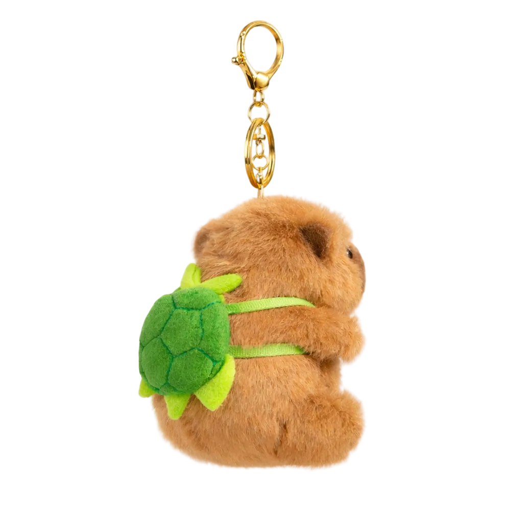 Plush keychain of a bear holding a green leaf on a white background
