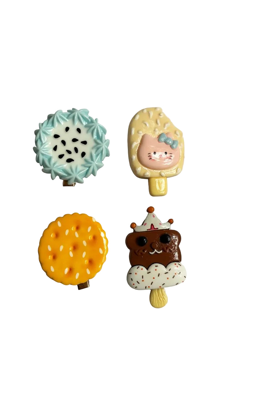 Four colorful ice cream cone figurines on a white background