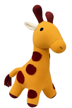 Plush giraffe toy on a white background