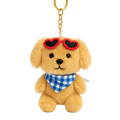 Plush dog keychain with heart-shaped sunglasses and a blue checkered bandana on a white background