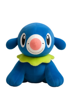 Blue plush toy with a pink nose and green collar on a white background