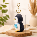 Black Penguin Plush Bag Charm with Blue Fish Pouch