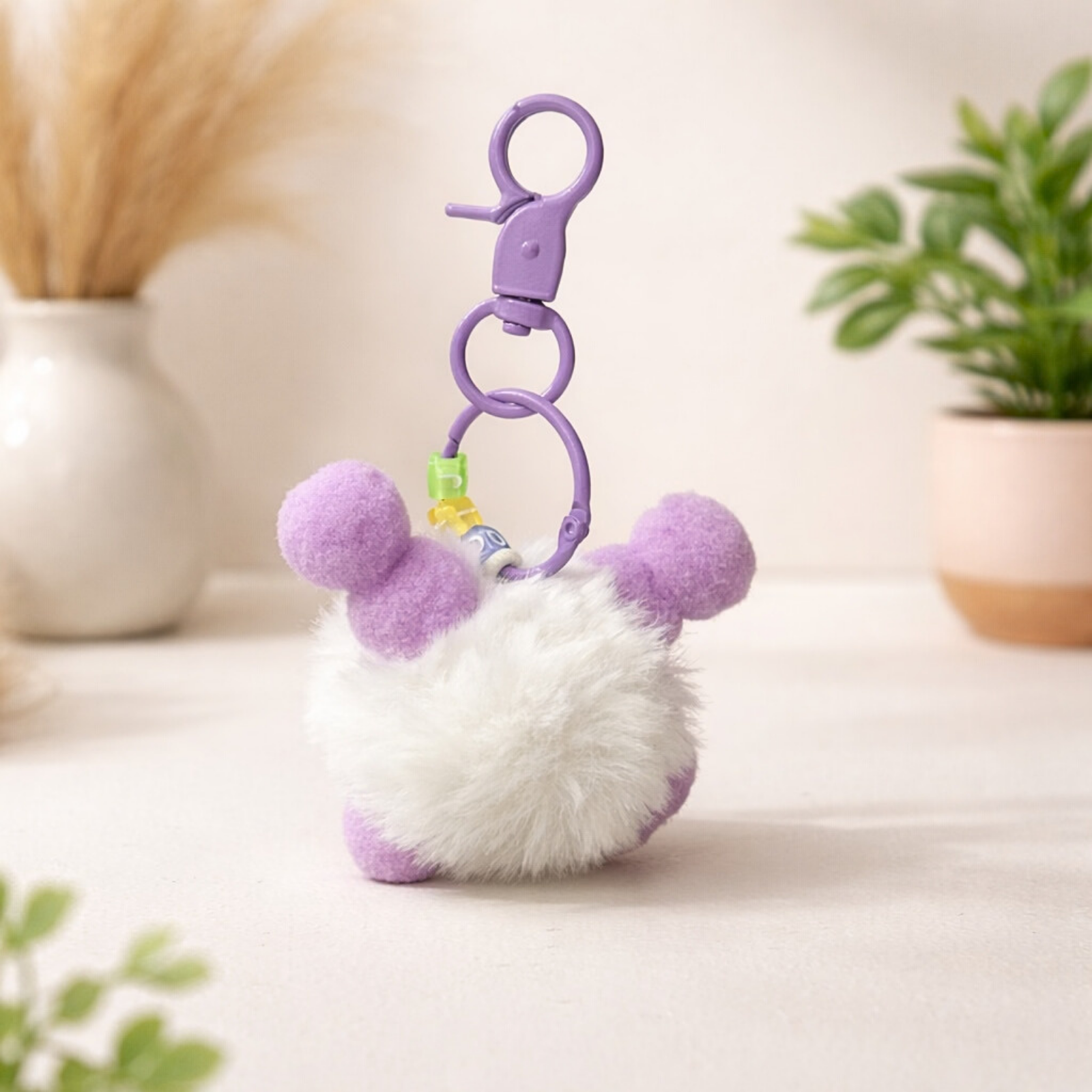 Purple & White Plush Monster Keychain with X Eyes & Red Nose