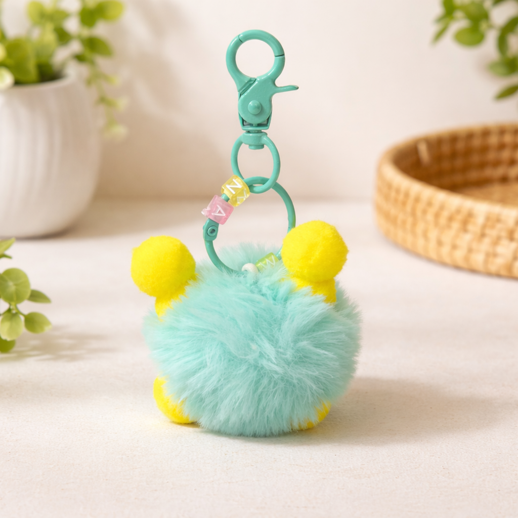 Turquoise Fluffy Monster Keychain with Yellow Ears & Funky Face