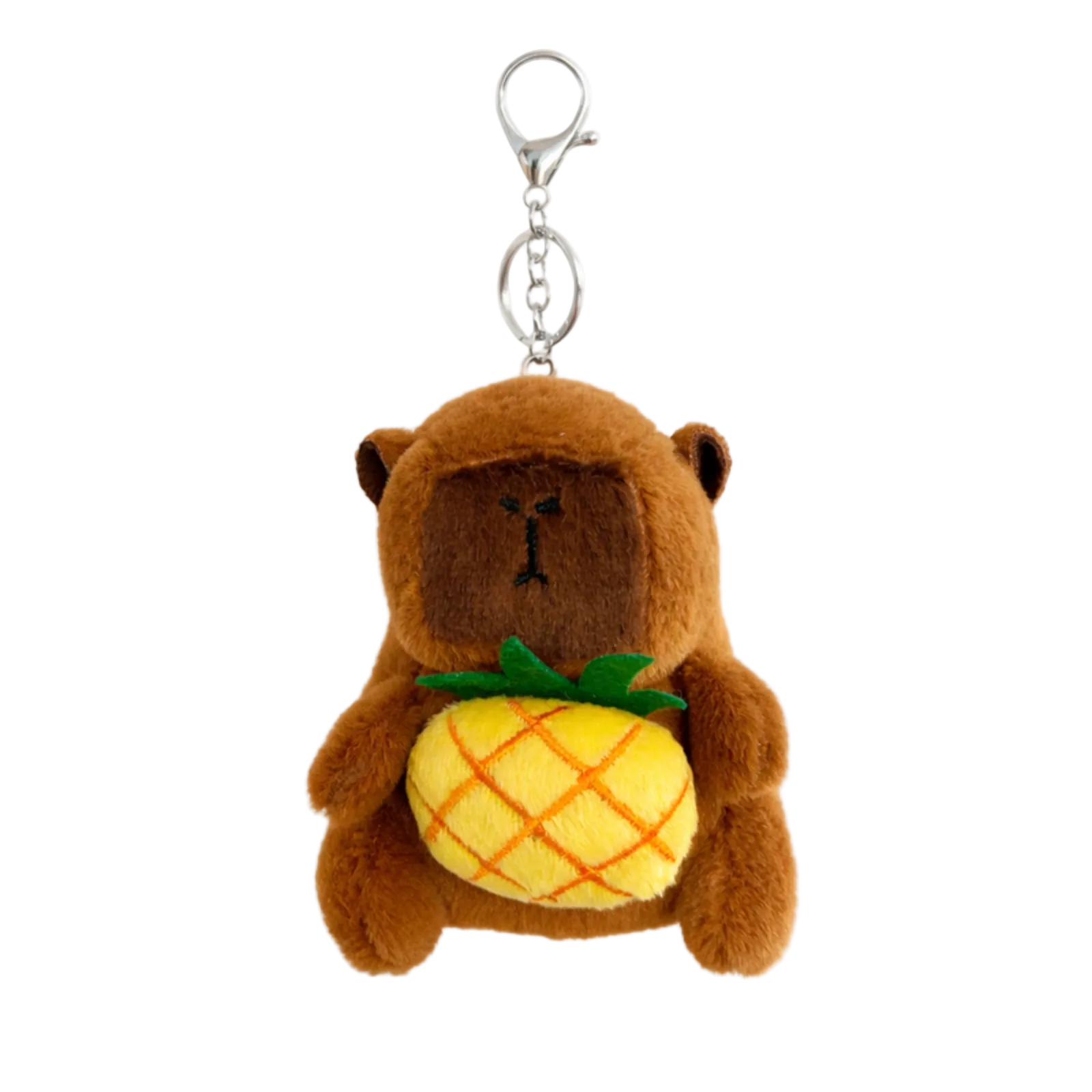 Plush bear keychain holding a pineapple on a white background
