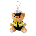 Plush teddy bear keychain in police uniform on a white background