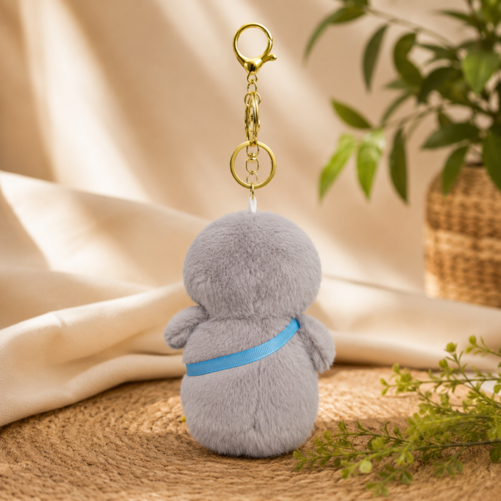 Grey Penguin Plush Bag Charm with Blue Fish Pouch