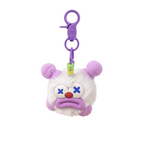 Plush keychain with a purple clip on a neutral background